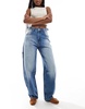 Bershka adjustable waist carpenter jeans in mid wash blue