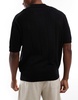 Bershka textured knitted polo shirt in black