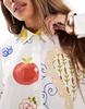 ASOS DESIGN oversized shirt dress with dropped pockets in postcard print