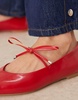 ASOS DESIGN Lithe pointed toe ballet flats with vamp tie in red