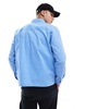 Another Influence striped poplin patch pocket shirt in blue