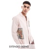 ASOS DESIGN relaxed revere shirt with print and applique in pink