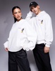 ASOS DESIGN Disney unisex oversized hoodie with Mickey print in off-white