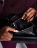 Armani Exchange logo shoulder bag with pocket details in black
