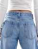 Bershka ripped knee wide leg jeans in mid blue