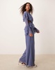 ASOS DESIGN exaggerated ruffle sleeve jumpsuit with cut out waist in blue