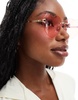 AIRE cosmic love heart sunglasses in pink