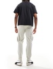 Bershka cuffed cargo pants in beige