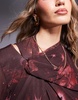 ASOS DESIGN mini dress with asymmetric cowl back detail and ruffles in cosmic burgundy print