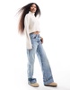 ASOS DESIGN Petite cropped roll neck sweater in cream