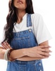 ASOS DESIGN denim overalls in mid blue
