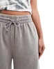 ASOS DESIGN heavyweight longline sweat shorts in acid gray wash