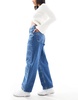 ASOS DESIGN barrel leg jean in check print