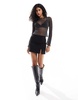 ASOS DESIGN glitter mesh sheer angel sleeve top in black