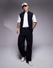 ASOS DESIGN knitted zip thru tank with funnel neck in navy
