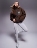 Weekend Collective nylon panel borg zip through fleece in brown