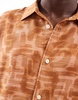 Bershka abstract graphic print shirt in burnt red