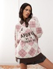 Aape By A Bathing Ape argyle knitted logo polo sweater in pink/brown