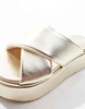 ASOS DESIGN Thunder padded cross strap flatform sandals in gold