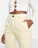 Bershka straight leg split hem tailored pants in sand