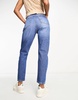 Bershka Petite comfort fit mom jeans in mid blue