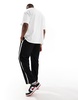 Bershka wide fit side panel sweatpants in black