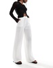Bershka crinkle beach pants in white