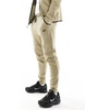 Nike Tech Fleece cuffed sweatpants in khaki