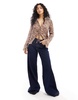 ASOS DESIGN satin tie front shirt in animal print