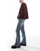 ASOS DESIGN stretch flare jeans in light wash blue with tint