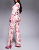 ASOS LUXE slim fit tailored pants with embellished button detail in rose print - part of a set
