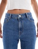 ASOS DESIGN super high waist flared jeans in mid blue