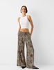 Bershka tie waist wide leg pants in leopard print