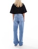Bershka Petite straight leg jeans in mid wash