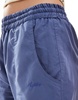 Reclaimed Vintage Revived x Glass Onion longline track short with lace hem