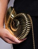 ASOS DESIGN round ammonite shell clutch bag with crossbody chain strap in gold