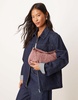 ASOS DESIGN faux suede shoulder bag with fold-over flap detail in mauve