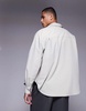 ASOS DESIGN volume oversized shirt with stepped hem in cream