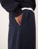 ASOS DESIGN baggy balloon brushed rib sweatpants in navy