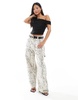 Bershka Petite carpenter pants in snakeskin print