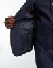 ASOS DESIGN premium skinny suit jacket in navy with two-way stretch
