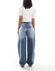 Bershka baggy balloon leg jeans in dirty wash indigo