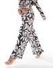 ASOS DESIGN textured mesh wide leg pants in black and white oversized floral - part of a set