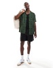 ASOS DESIGN relaxed revere shirt with tile print in green