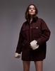 Topshop denim trucker jacket with contrast corduroy collar in burgundy