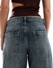 Bershka Petite baggy wide leg jeans in mid wash blue
