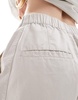 ASOS DESIGN tapered pants with tab hem detail in stone - part of a set