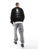 Bershka sweatshirt with feather graphic in black