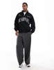 Bershka 1/4 zip printed sweatshirt in black
