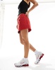 ASOS DESIGN denim mini skirt in red